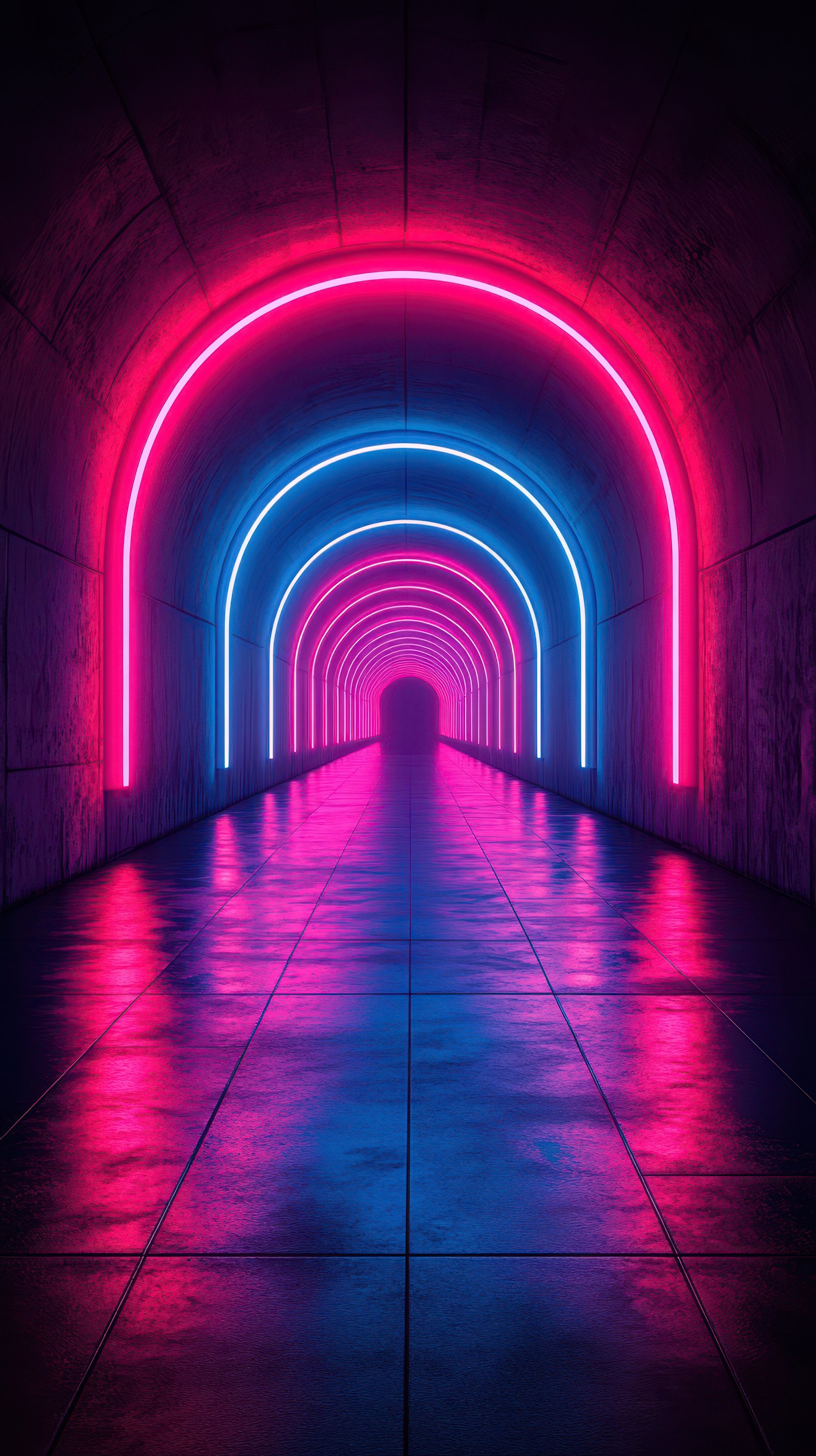 Colorful neon tunnel with glowing arcs illuminating the pathway in an underground corridor at night